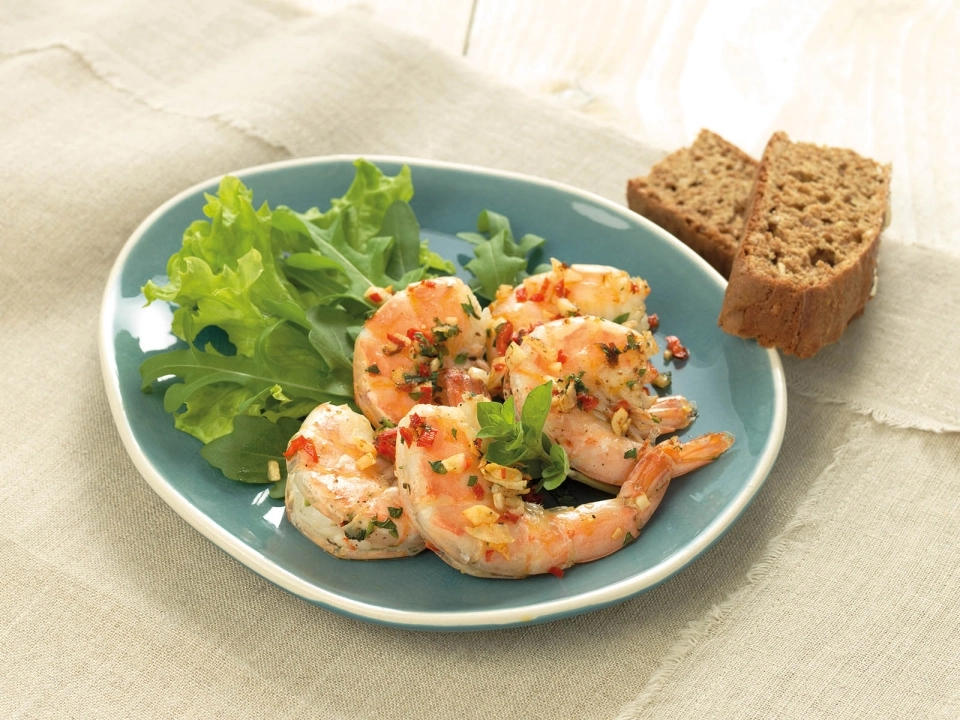 Grote garnalen met knoflook