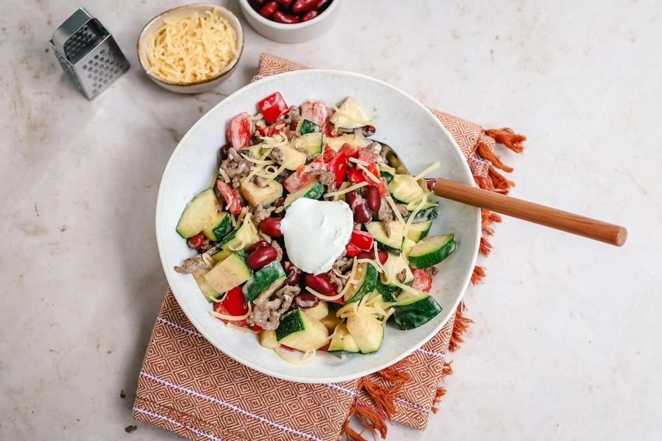 Romige roerbak met courgette, paprika & gehakt