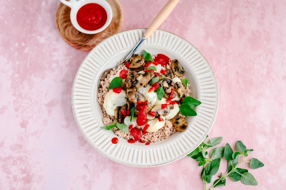 Couscous met bloemkool & champignons